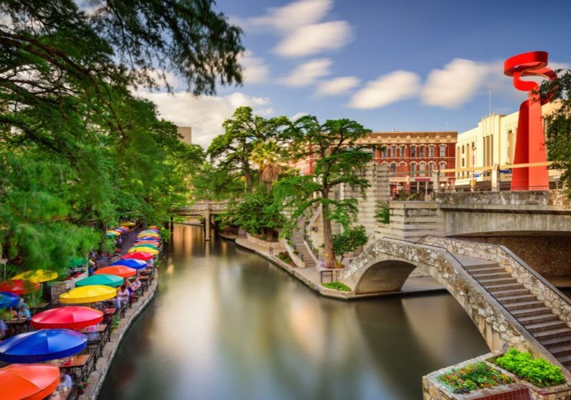 Inside image of a house along with a river and some people sitting